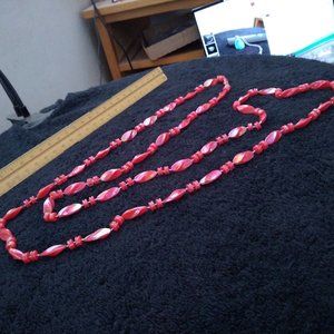 Pink pedal and twist mardi gra fun wear beaded body lengh chain hand made